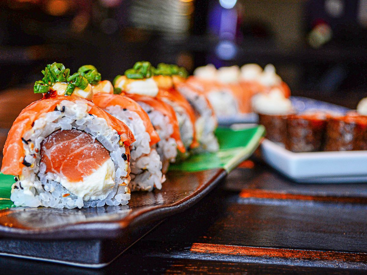 Photo of Salmon sushi roll with tuna and cream cheese